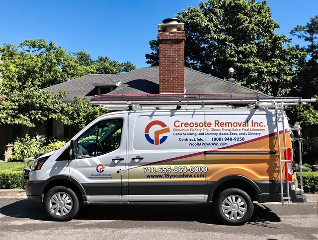 Wareham Chimney Sweep technician removing creosote safely in Wareham, MA