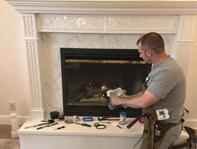 Wareham Chimney Sweep performing fireplace maintenance in Wareham, MA